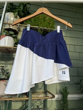Sports Illustrated Asymmetrical Tennis Skirt with Shorts in White Blue Sapphire